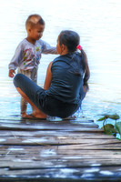 Child washing small boy