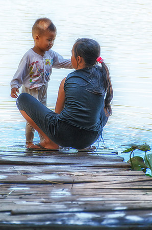 Child washing small boy